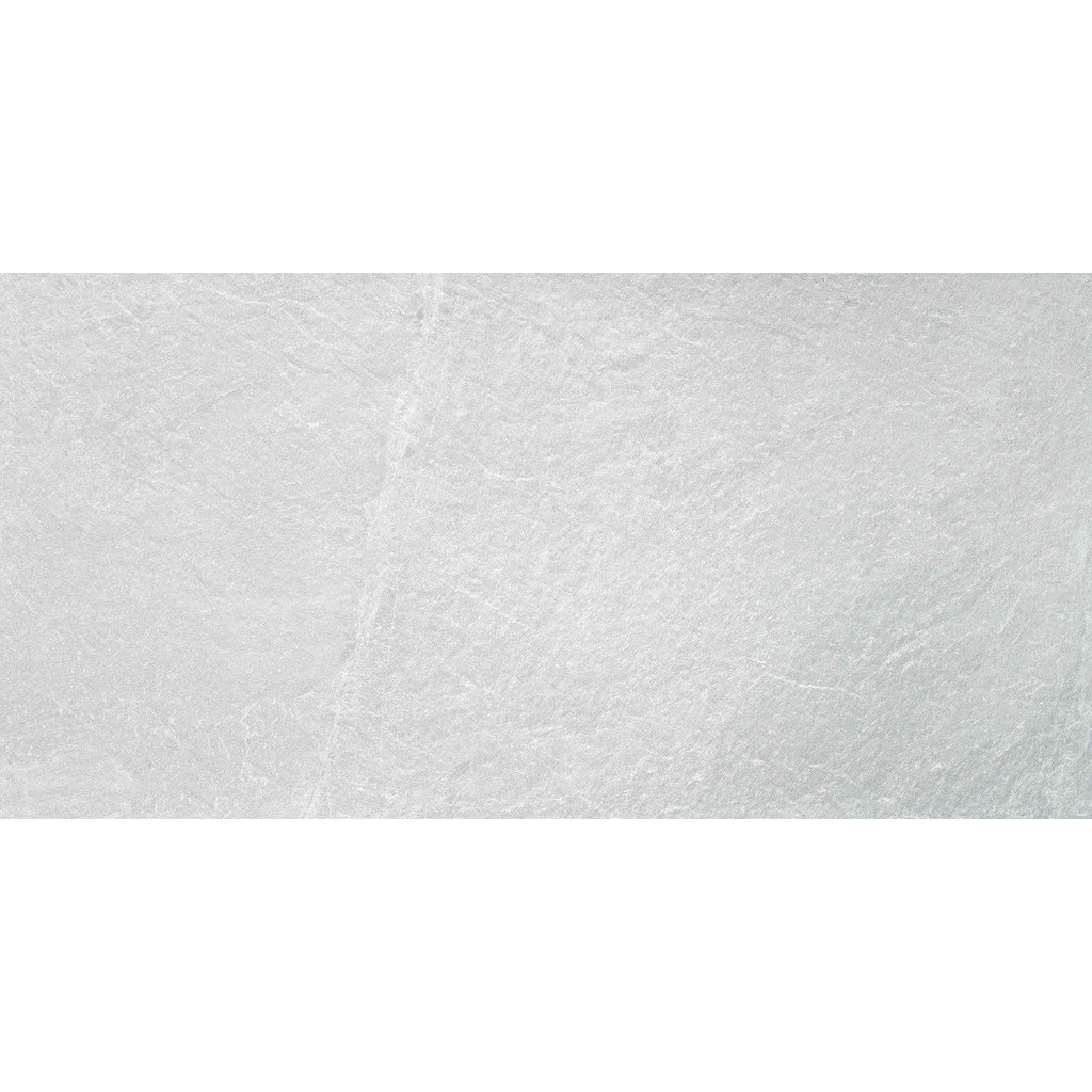 Detailed close-up of Quarry White tile surface showing soft white texture and stone-like detailing.