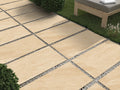 Natural rasa beige outdoor porcelain paving tiles 900x600mm laid on a UK garden patio