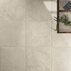 Highlighting the tile’s aged limestone texture and matt porcelain finish from above.