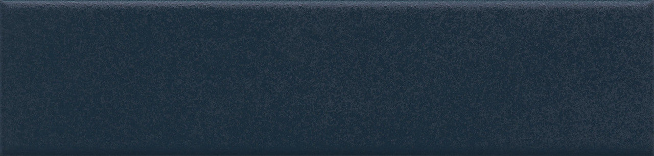 Close-up of Serene Blue Glossy Metro Wall Tile 6cm x 25cm showing smooth shiny finish and deep blue color