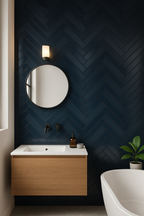 Bathroom featuring Serene Blue Matt Metro Wall Tiles in a herringbone pattern with floating vanity unit and round mirror – 6cm x 25cm tiles