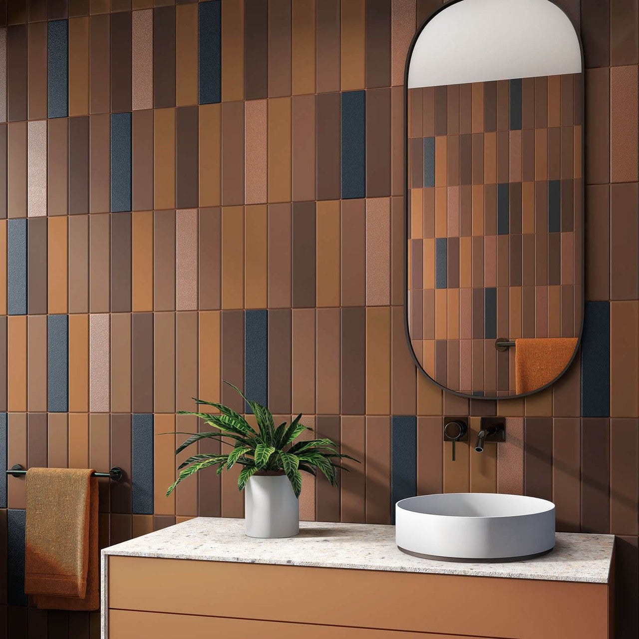Detail of Serene Brown Matt Metro Tiles in a bathroom setting with black fixtures and mixed finishes.