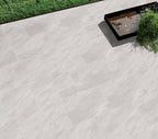 Shadow grey stone effect porcelain paving slabs 900x600mm close-up surface texture