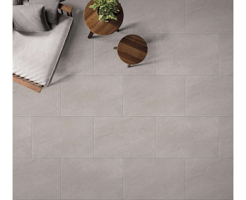 Sheffield stone outdoor porcelain paving 900x600mm laid on landscaped terrace