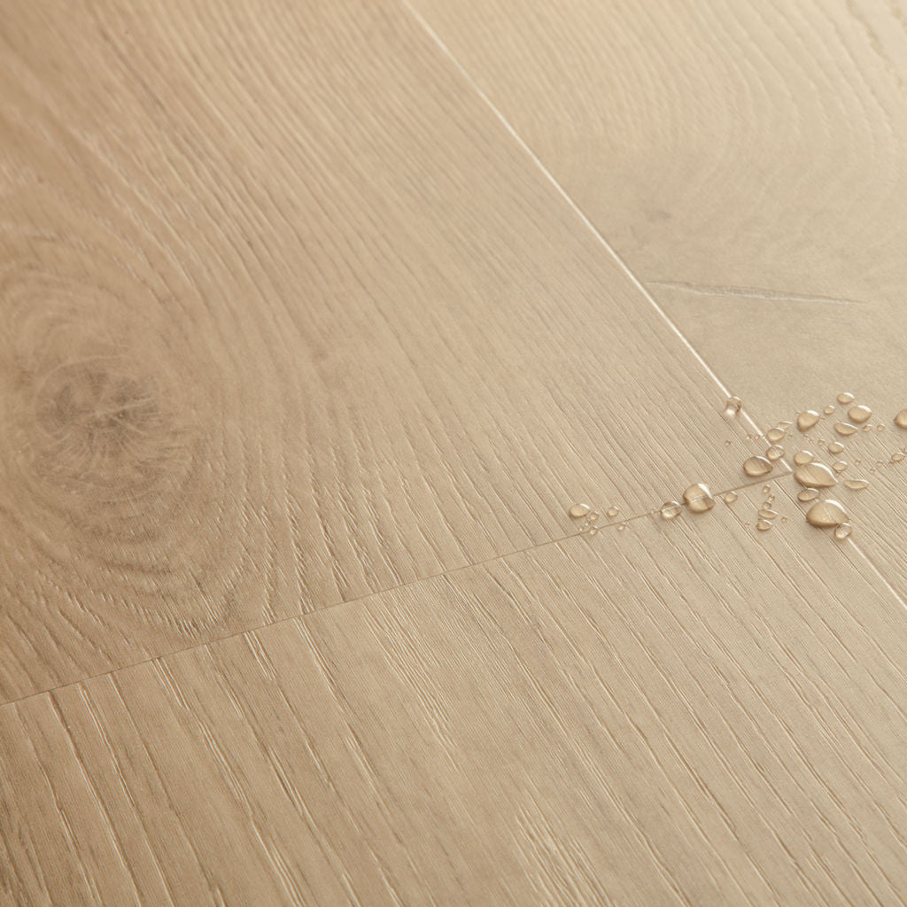 Quick-Step Alpha Vinyl Blos – Coast Oak Sand Rigid Vinyl Flooring (AVSPU40322) - Premium Quick-Step collection featuring oak luxury vinyl tile flooring with waterproof technology and easy click-fit installation