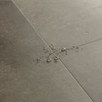 Quick-Step Alpha Vinyl Illume Cloudy Concrete AVMTU40273 - Premium Quick-Step collection featuring luxury vinyl tile flooring with waterproof technology and easy click-fit installation