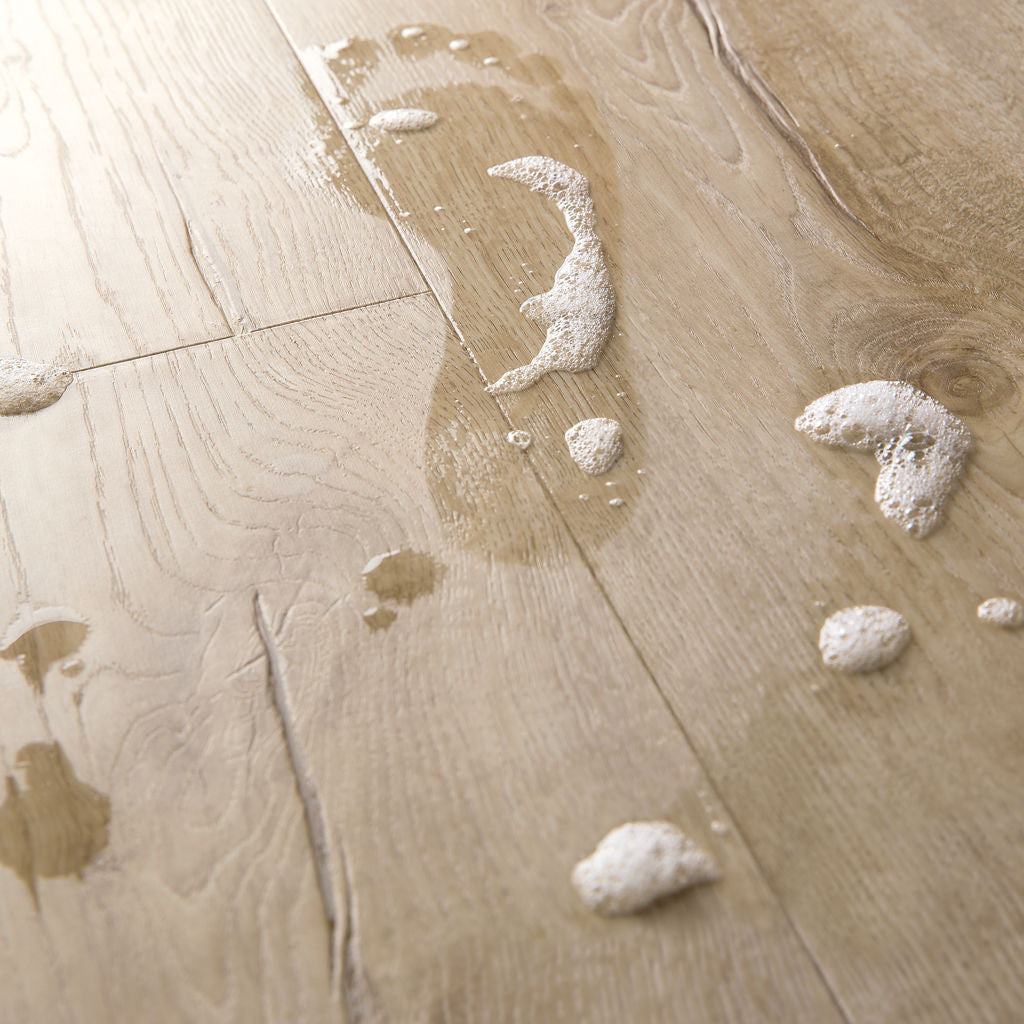 Quick-Step Impressive Classic Oak Beige 8mm Laminate Flooring (IM1847) - Premium Impressive collection featuring oak luxury vinyl tile flooring with waterproof technology and easy click-fit installation