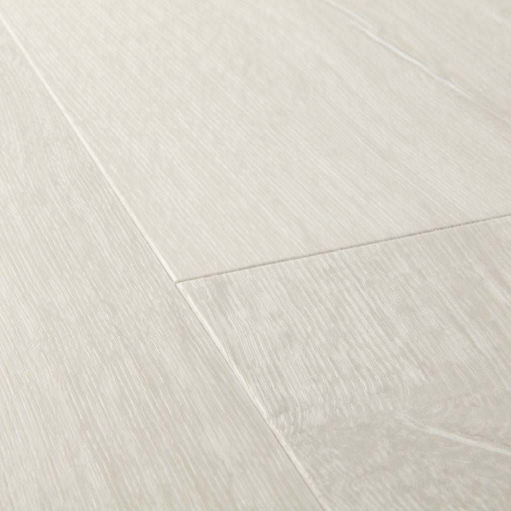 Quick‑Step Impressive Patina Classic Oak light Planks 8mm Laminate Flooring (IM3559) - Premium Impressive collection featuring oak luxury vinyl tile flooring with waterproof technology and easy click-fit installation
