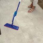 Quick‑Step Muse Stained Concrete MUS5491 8mm Laminate Flooring (MUS5491) - Premium Quick-Step collection featuring luxury vinyl tile flooring with waterproof technology and easy click-fit installation