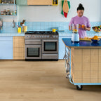 Quick-Step Alpha Vinyl Blos – Coast Oak Beige Rigid Vinyl Flooring (AVSPU40321) - Premium Quick-Step collection featuring oak luxury vinyl tile flooring with waterproof technology and easy click-fit installation