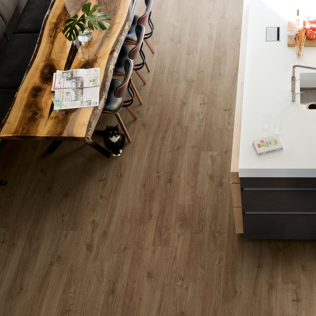 Quick-Step Eligna Newcastle Oak Brown 8mm Laminate Flooring (EL3582) - Premium Quick-Step collection featuring oak luxury vinyl tile flooring with waterproof technology and easy click-fit installation