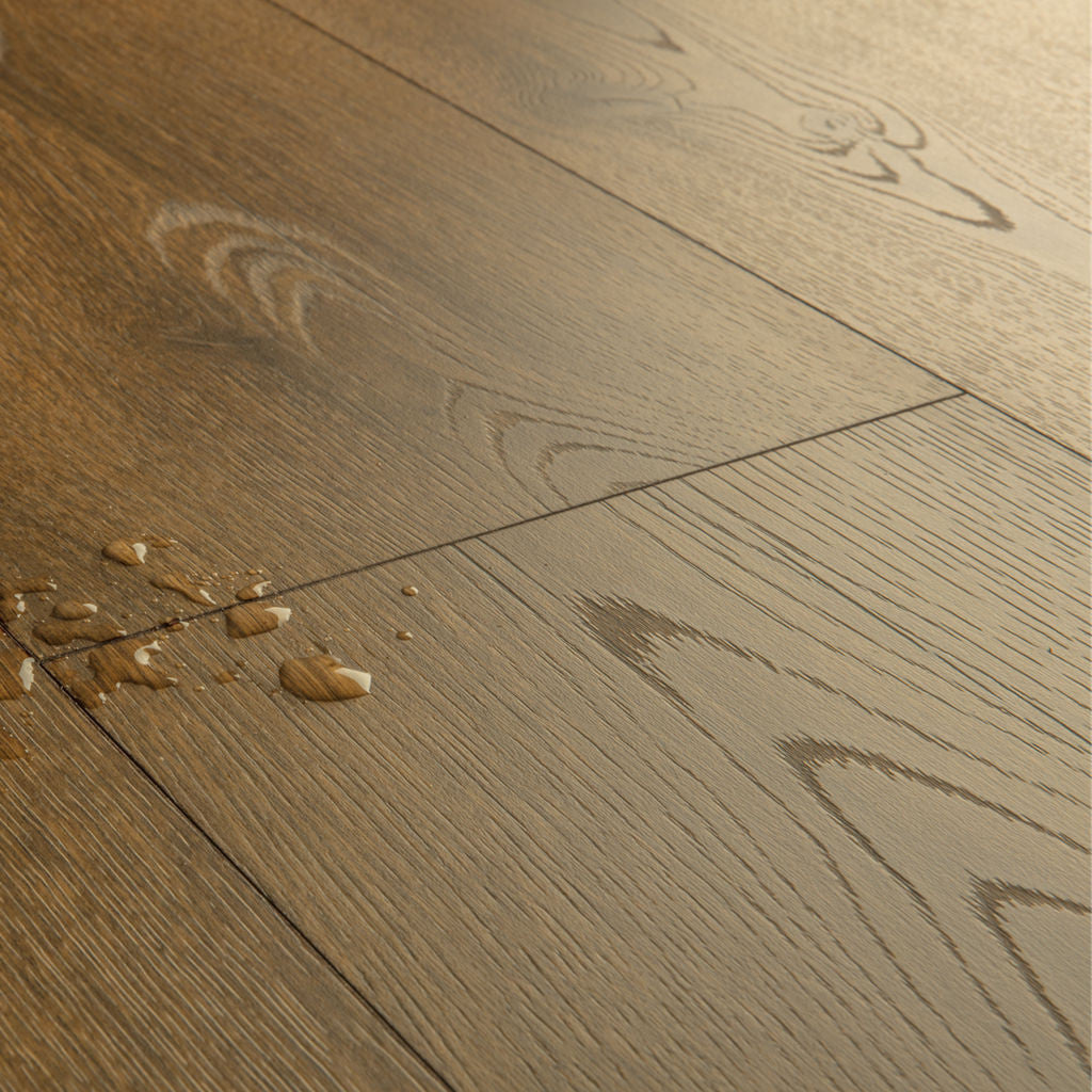 Quick-Step Classic Cocoa Brown Oak CLM5793 7mm Laminate Flooring (CLM5793) - Premium Quick-Step collection featuring brown luxury vinyl tile flooring with waterproof technology and easy click-fit installation