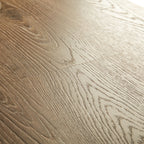 Quick-Step Eligna Newcastle Oak Brown 8mm Laminate Flooring (EL3582) - Premium Quick-Step collection featuring oak luxury vinyl tile flooring with waterproof technology and easy click-fit installation