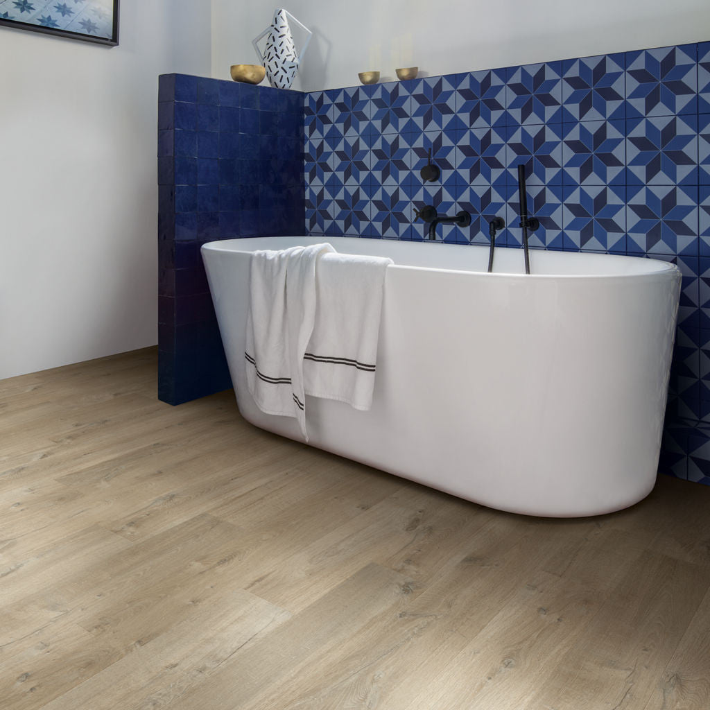 Quick-Step Impressive Ultra Soft Oak Light Brown IMU3557 12mm Laminate Flooring 9.5mm Laminate Flooring (IMU3557) - Premium Impressive collection featuring oak luxury vinyl tile flooring with waterproof technology and easy click-fit installation