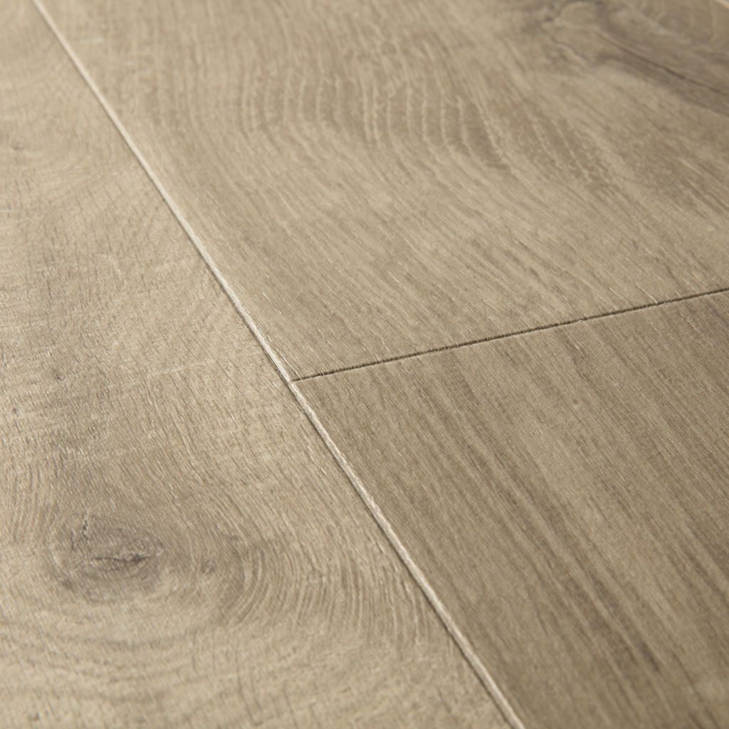 Quick‑Step Impressive Soft Oak Light Brown Planks 8mm Laminate Flooring (IM3557) - Premium Impressive collection featuring oak luxury vinyl tile flooring with waterproof technology and easy click-fit installation