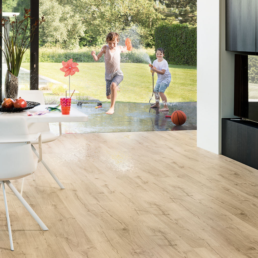 Quick-Step Impressive Ultra Classic Oak Beige IMU1847 12mm Laminate Flooring 9.5mm Laminate Flooring (IMU1847) - Premium Impressive collection featuring oak luxury vinyl tile flooring with waterproof technology and easy click-fit installation