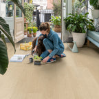 Quick-Step Alpha Vinyl Blos – Buttermilk Oak Rigid Vinyl Flooring (AVSPU40277) - Premium Quick-Step collection featuring oak luxury vinyl tile flooring with waterproof technology and easy click-fit installation