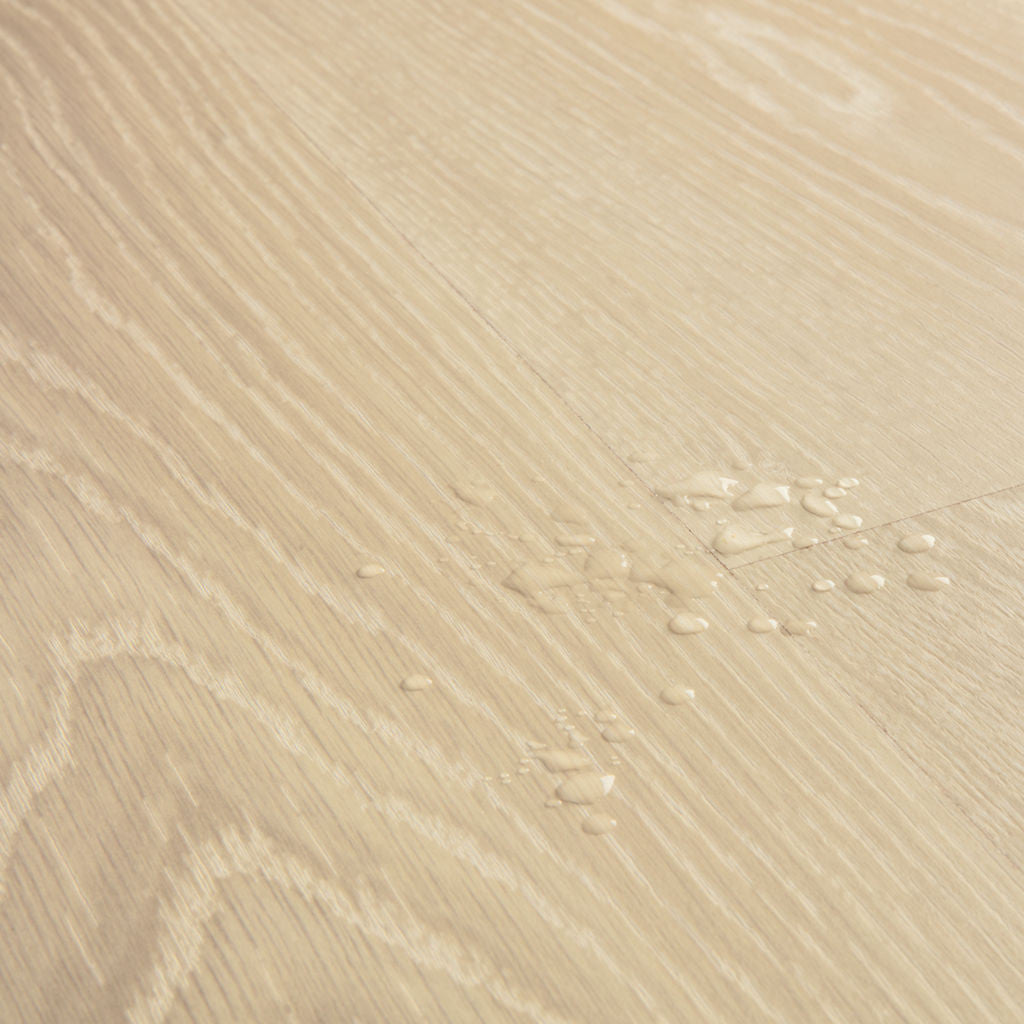 Quick-Step Classic Frosty Beige Oak CLM5799 7mm Laminate Flooring (CLM5799) - Premium Quick-Step collection featuring beige luxury vinyl tile flooring with waterproof technology and easy click-fit installation