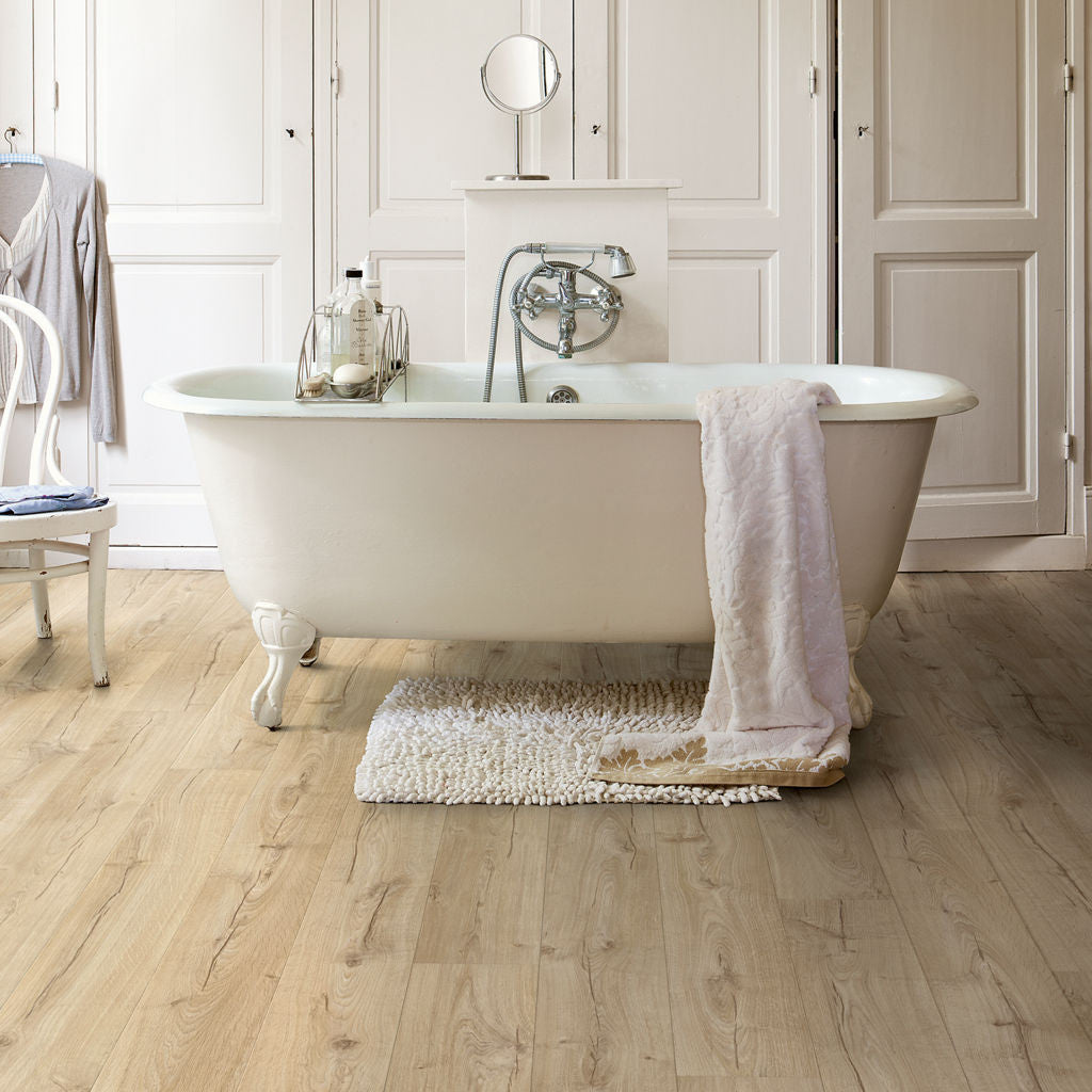 Quick-Step Impressive Ultra Classic Oak Beige IMU1847 12mm Laminate Flooring 9.5mm Laminate Flooring (IMU1847) - Premium Impressive collection featuring oak luxury vinyl tile flooring with waterproof technology and easy click-fit installation
