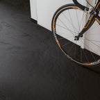 Quick‑Step Muse Black Slate MUS5492 8mm Laminate Flooring (MUS5492) - Premium Quick-Step collection featuring black luxury vinyl tile flooring with waterproof technology and easy click-fit installation