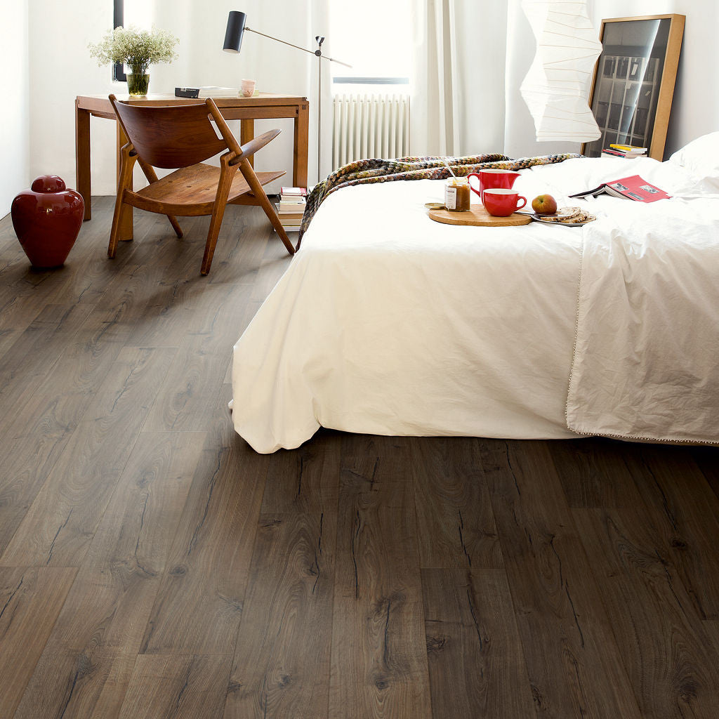 Quick-Step Impressive Ultra Classic Oak Brown IMU1849 12mm Laminate Flooring 9.5mm Laminate Flooring (IMU1849) - Premium Impressive collection featuring oak luxury vinyl tile flooring with waterproof technology and easy click-fit installation