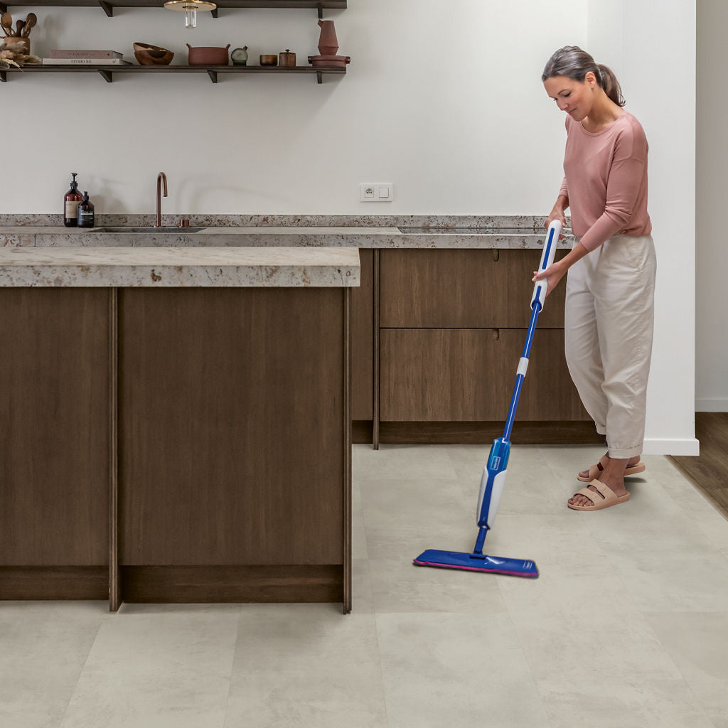 Quick‑Step Muse Grey Concrete MUS5488 8mm Laminate Flooring (MUS5488) - Premium Quick-Step collection featuring grey luxury vinyl tile flooring with waterproof technology and easy click-fit installation