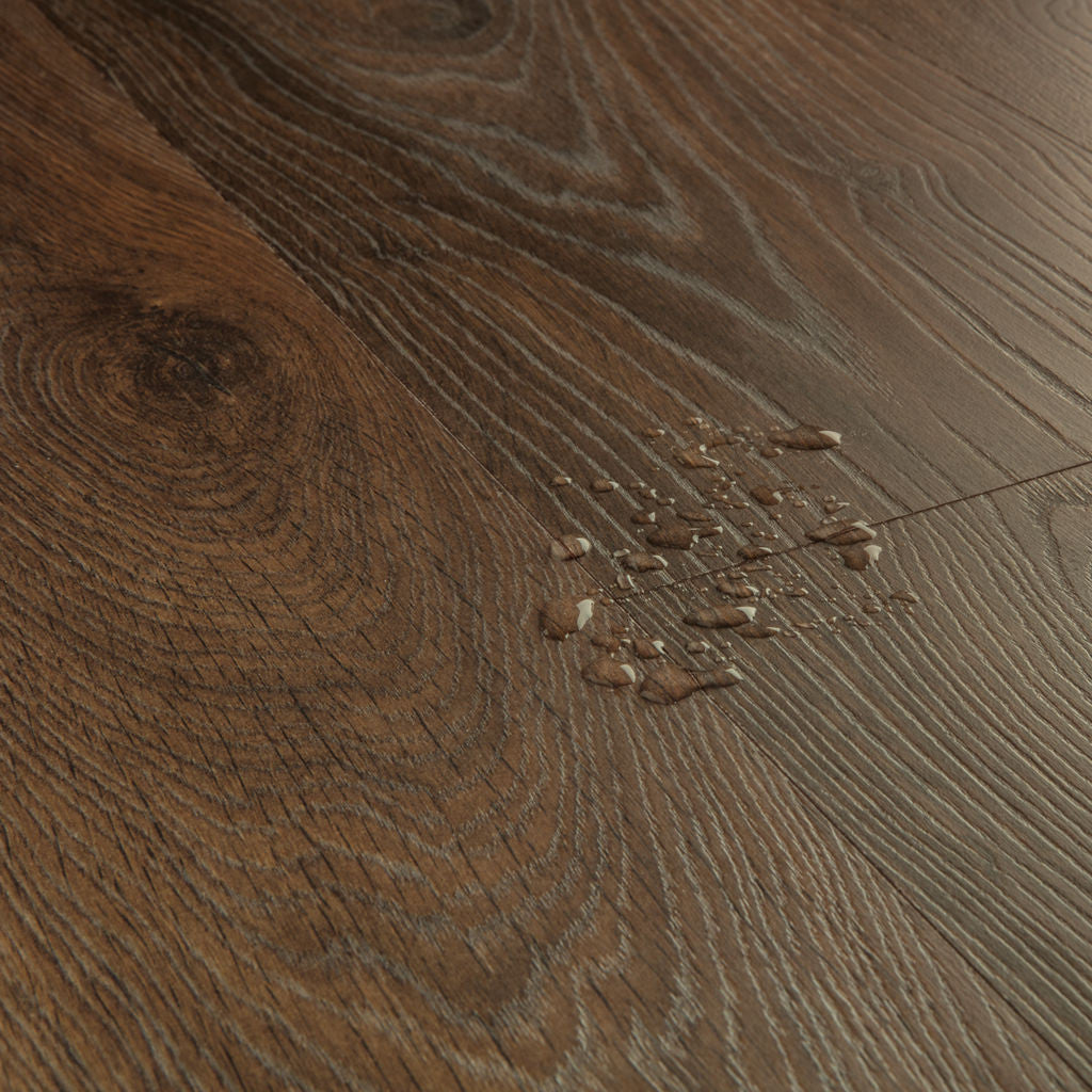 Quick-Step Classic Peanut Brown Oak CLM5800 8mm Laminate Flooring (CLM5800) - Premium Quick-Step collection featuring brown luxury vinyl tile flooring with waterproof technology and easy click-fit installation