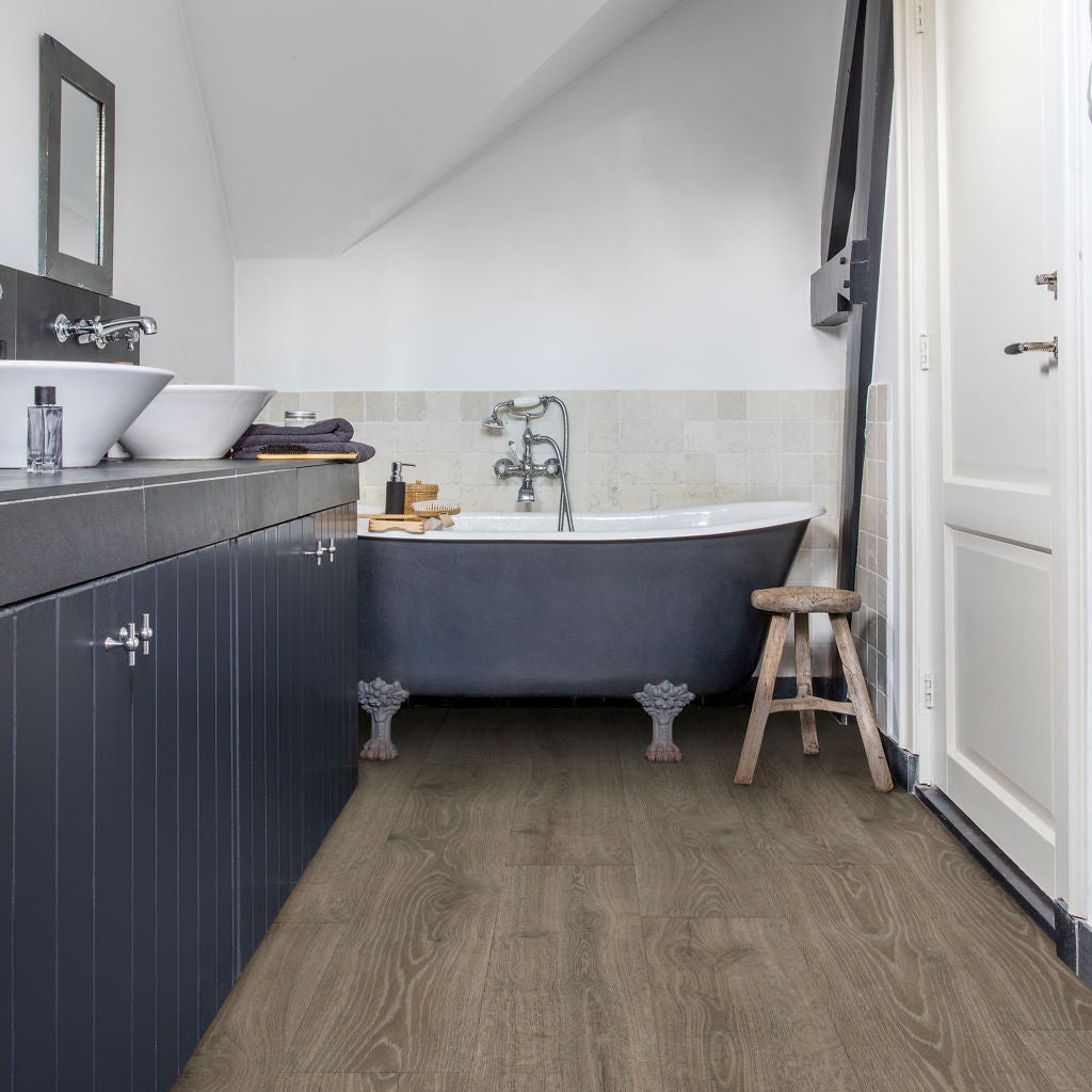Quick‑Step Majestic Woodland Oak Brown 9.5mm Laminate Flooring (MJ3548) - Premium Quick-Step collection featuring oak luxury vinyl tile flooring with waterproof technology and easy click-fit installation