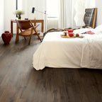 Quick‑Step Impressive Classic Oak Brown 8mm Laminate Flooring (IM1849) - Premium Impressive collection featuring oak luxury vinyl tile flooring with waterproof technology and easy click-fit installation