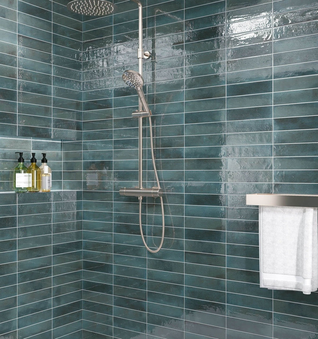 Contemporary bathroom featuring Urban Blue Glossy Metro Wall Tiles in a vertical stack layout, showcasing their deep blue tones and high-gloss finish.