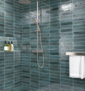 Contemporary bathroom featuring Urban Blue Glossy Metro Wall Tiles in a vertical stack layout, showcasing their deep blue tones and high-gloss finish.
