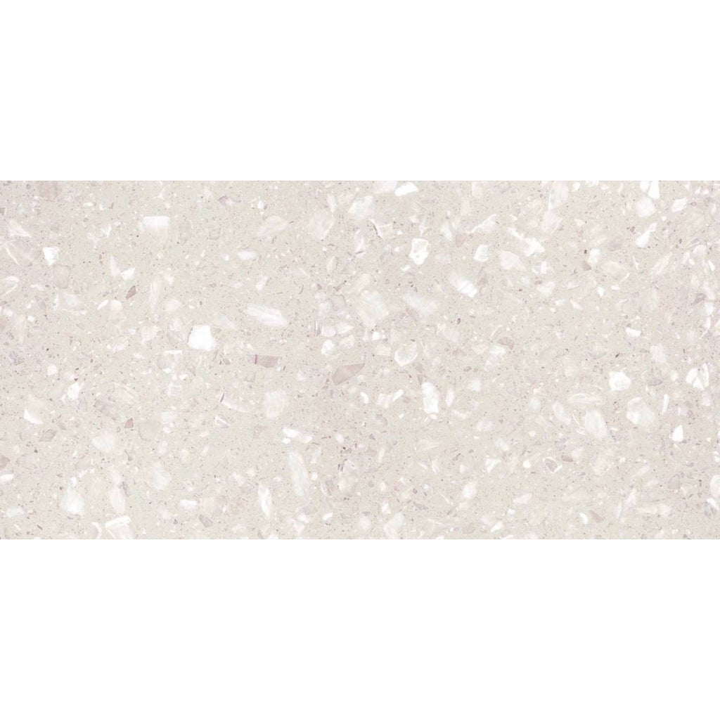 Close-up view of Veneto White Terrazzo Effect Wall & Floor Tile showing its matt finish and soft white base with scattered light grey and ivory stone flecks.