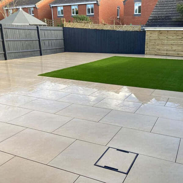 Warm beige hammered stone effect outdoor porcelain paving tiles 900x600mm
