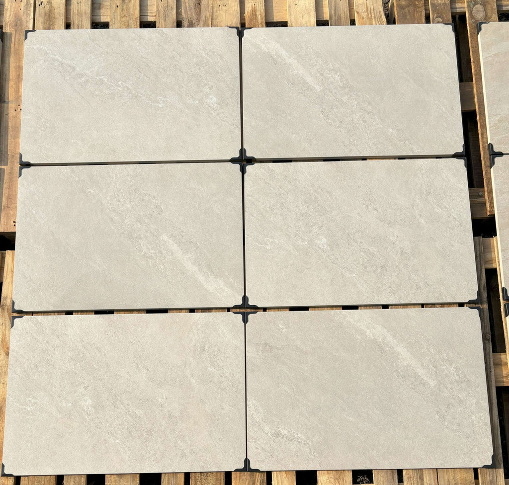 White yorkstone effect porcelain patio slabs 900x600mm close-up