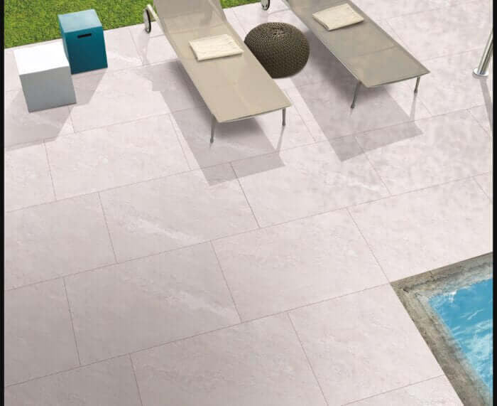 Yorkstone white outdoor porcelain paving tiles on contemporary patio terrace