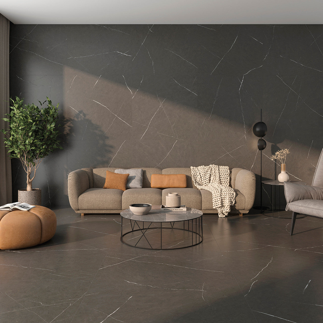 Zena Grey Matt Tile styled in a modern living room with neutral furnishings and warm lighting.