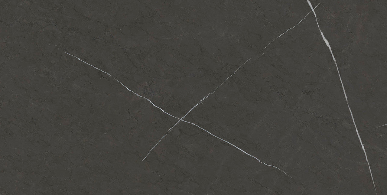 Close-up of Zena Grey Matt Tile showcasing its natural stone-effect texture and white veining.